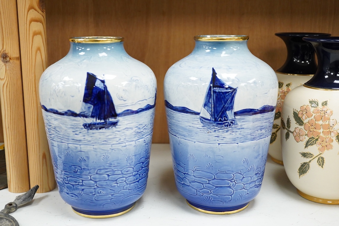 Three pairs of vases to include hexagonal Wilton ware and Delft blue and white, largest 26cm high